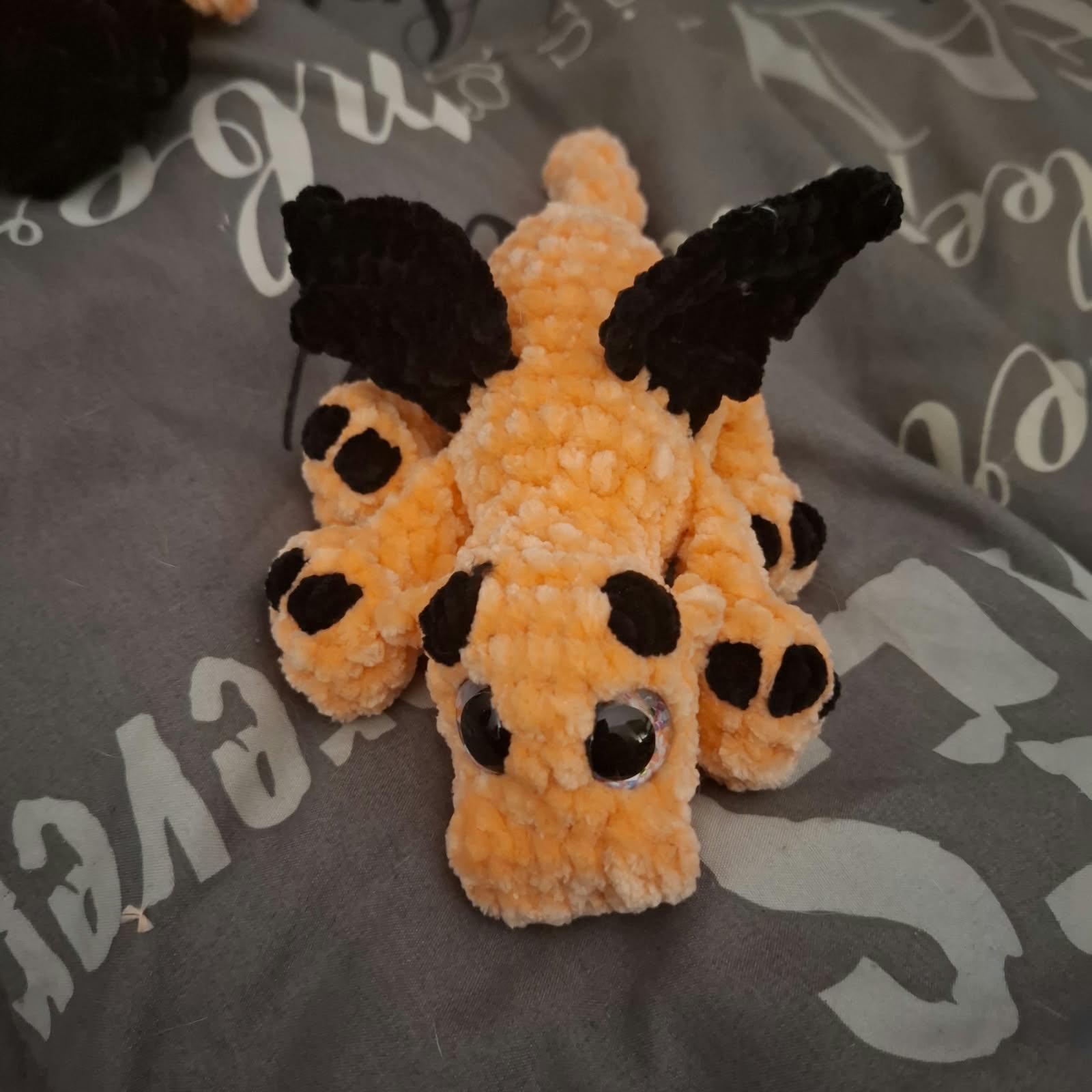 Handmade crochet dragon: peach and brown