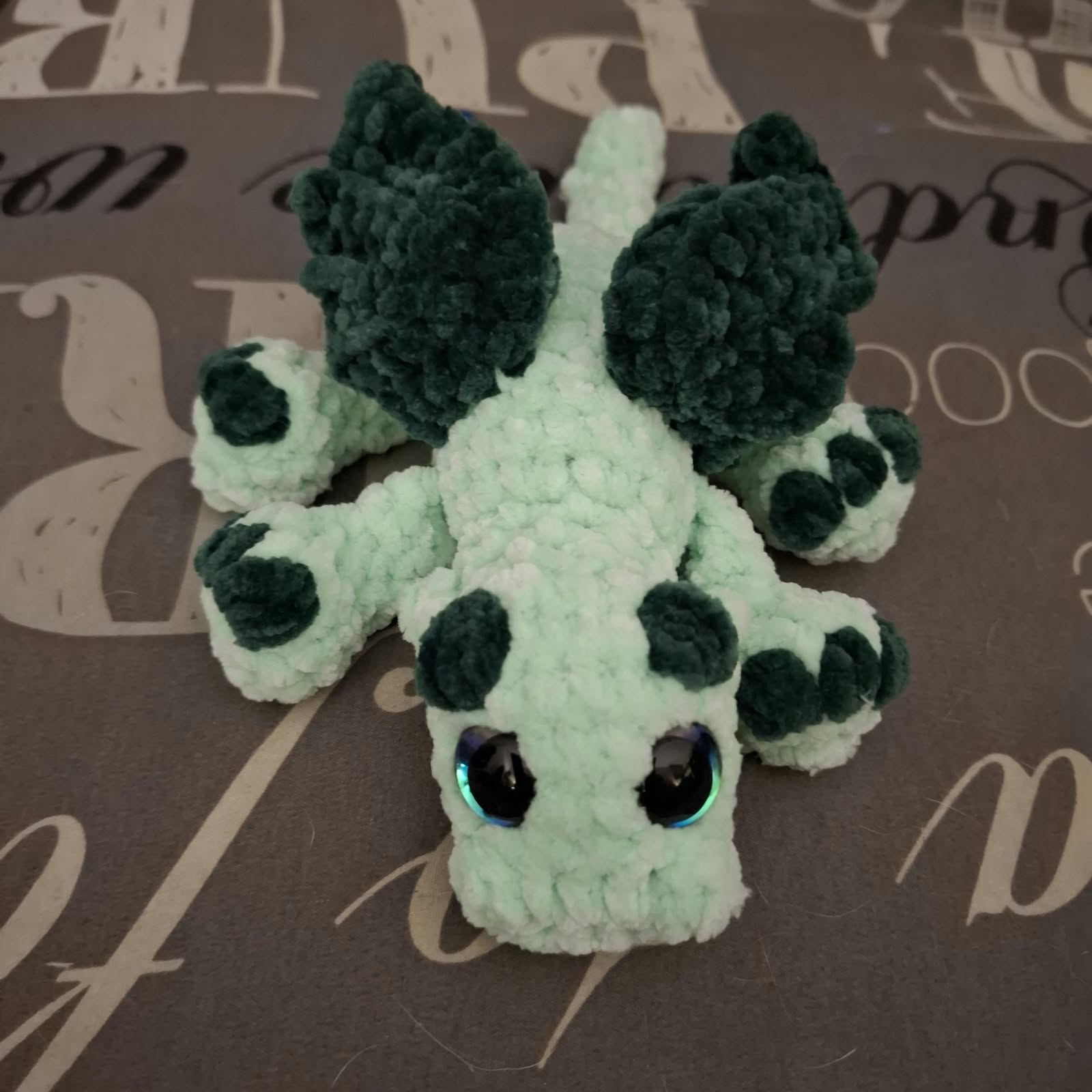 Handmade crochet dragon: mint and forest green