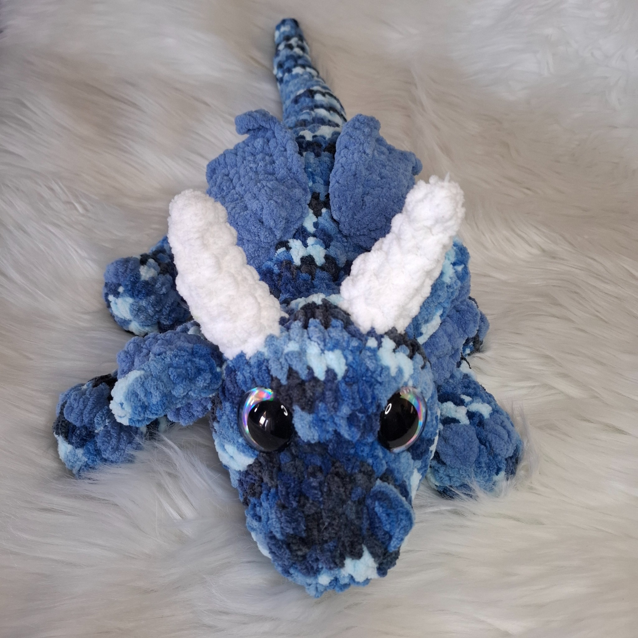 Handmade crochet dragon: deep blue shades