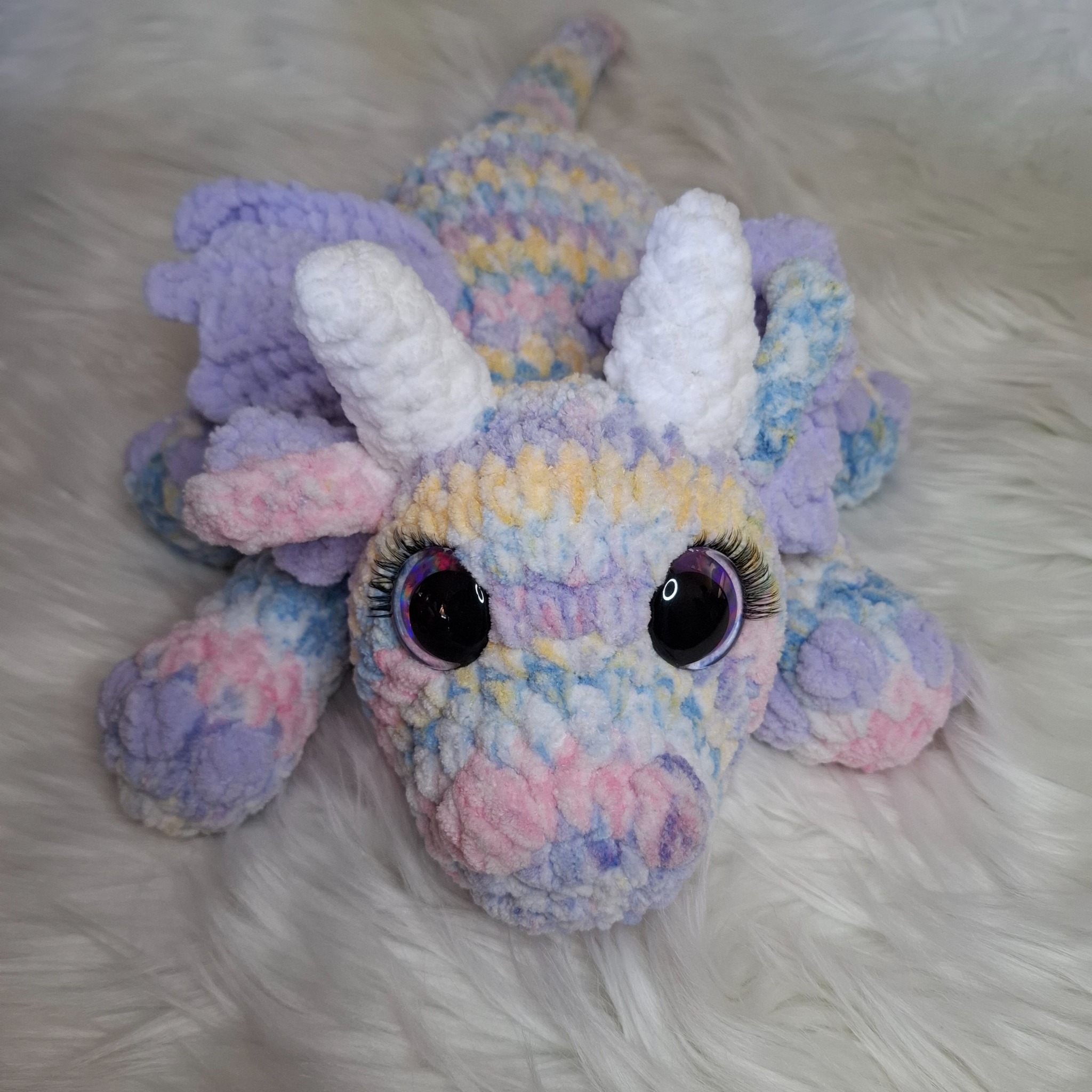 Handmade crochet dragon: lilac and pastel shades